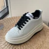 Chanel Chunky-Soled Sheepskin Color-Block Sneakers - White and Black
