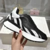 Alexander McQueen Sprint Runner Sneaker - Black and white stripes