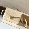 Louis Vuitton Pochette Métis Handbag in Monogram Canvas - White